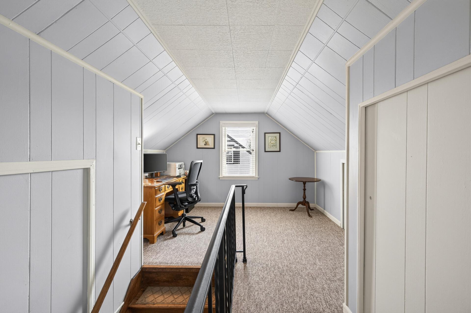Upper level used as a bedroom AND an office. Working from home is so common these days and this is a perfect space without taking up an entire room!