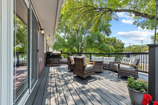 Enjoy endless backyard BBQ days on this beautiful deck that overlooks the backyard.
