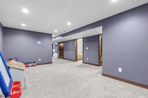 Lower level hallway to bedrooms and GREAT bonus space!