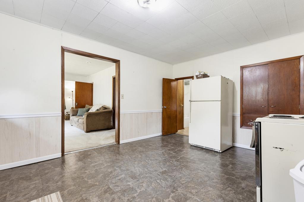 Kitchen has access to the living room and main floor full bathroom