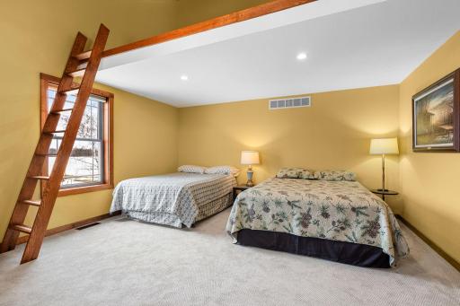 Twin upstairs bedrooms both with loft areas above