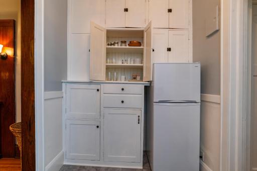 The original cabinetry is the focal point of the kitchens in the one bedroom units.