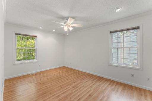 Primary bedroom upper level with beautiful flooring