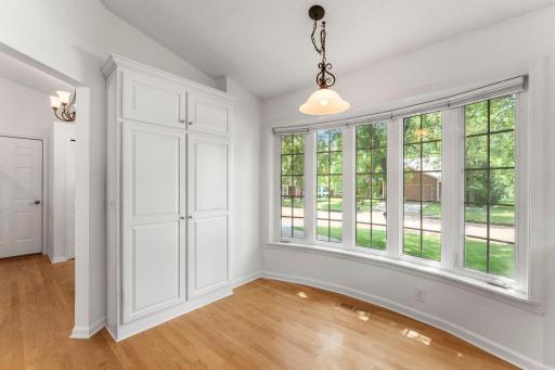 Beautiful bayed window area for breakfast seating with added pantry storage