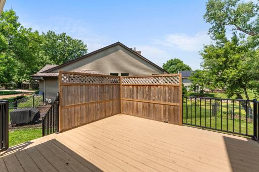 With the deck tucked onto the side of the home and this screen you can enjoy your privacy