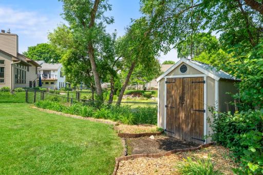 Charming garden shed and low maintenance landscaping
