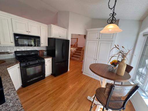 Kitchen with plenty of cupboards and room for a breakfast table