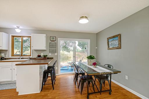 Dining room with additional seating at kitchen counter