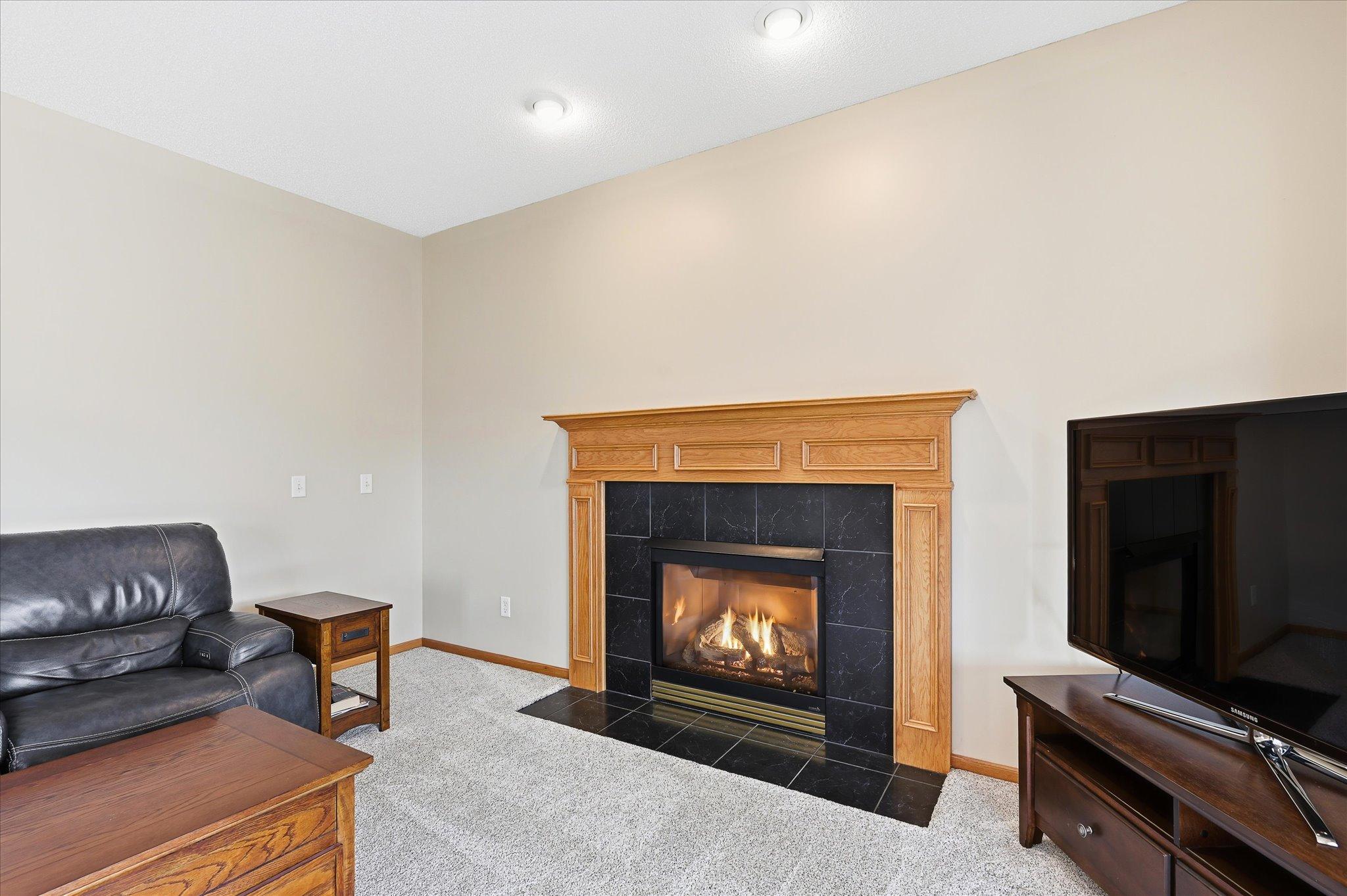 Cozy up by the fireplace on chilly evenings.