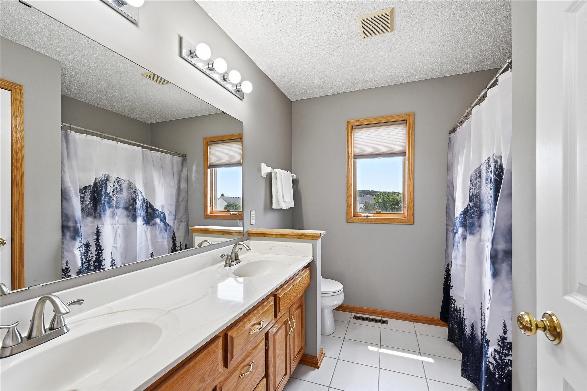 Double vanity provides extra convenience.
