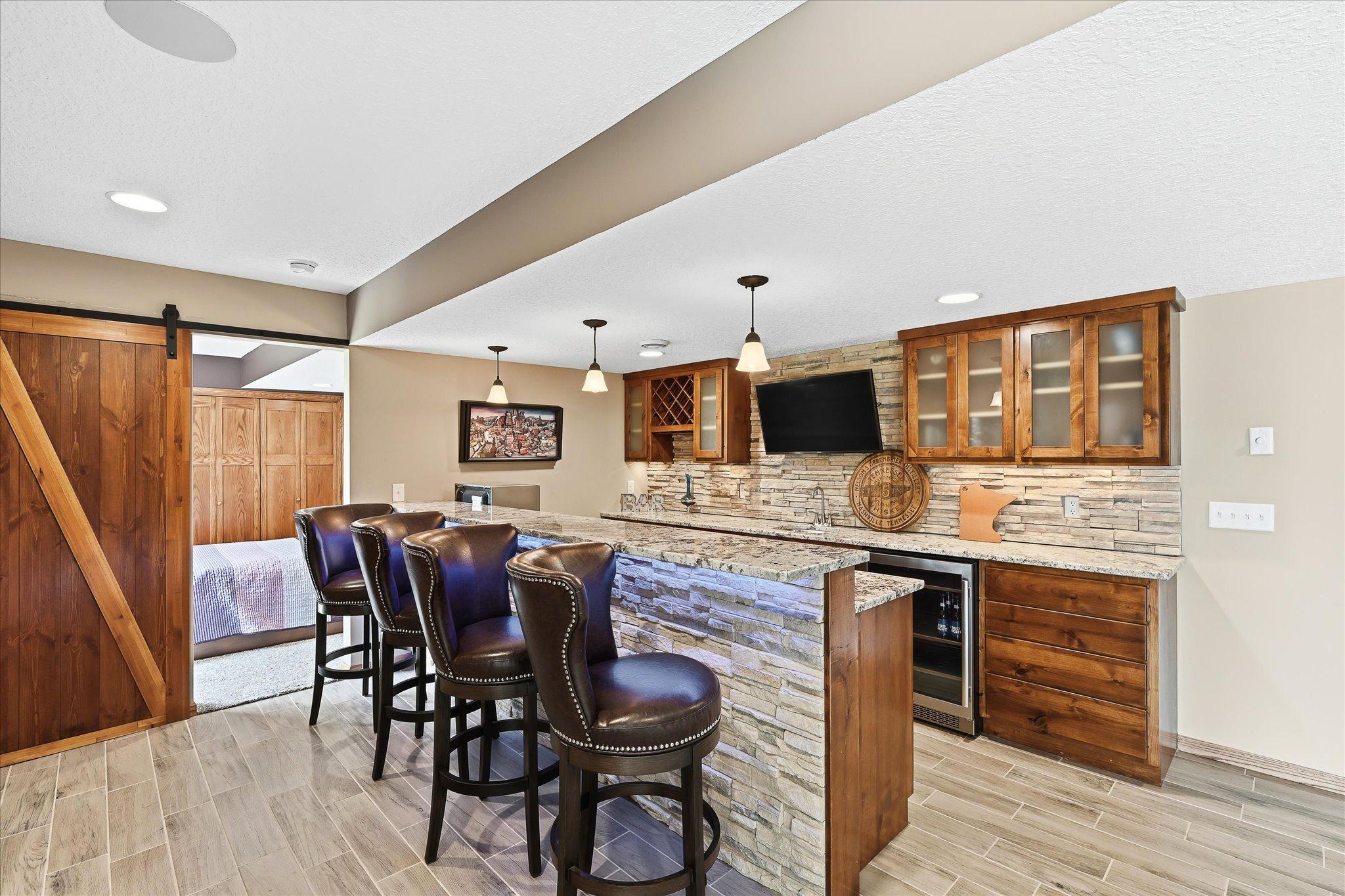 Dedicated wet bar creates the perfect hosting space.