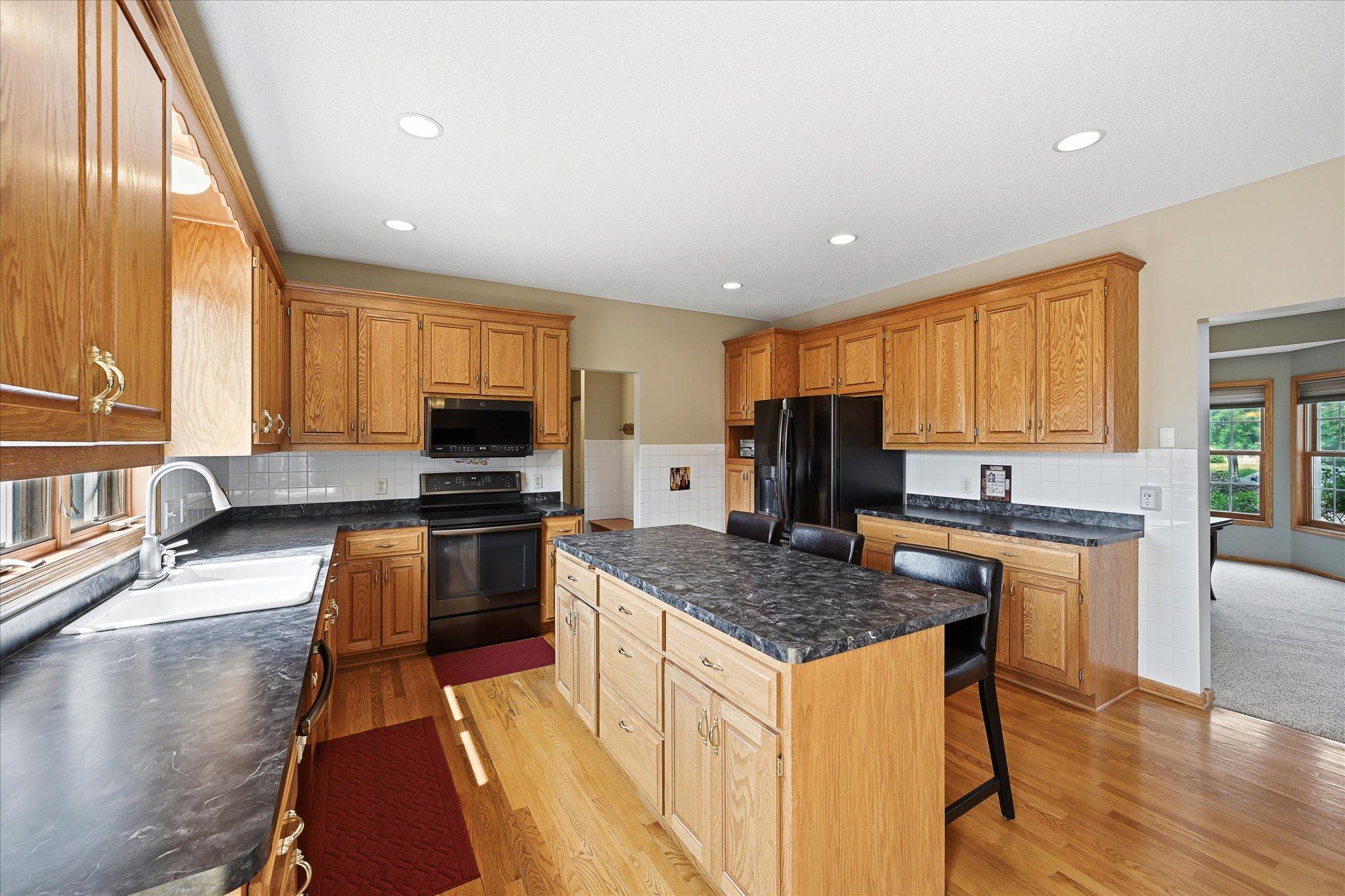 Functional kitchen with abundant cabinet storage.