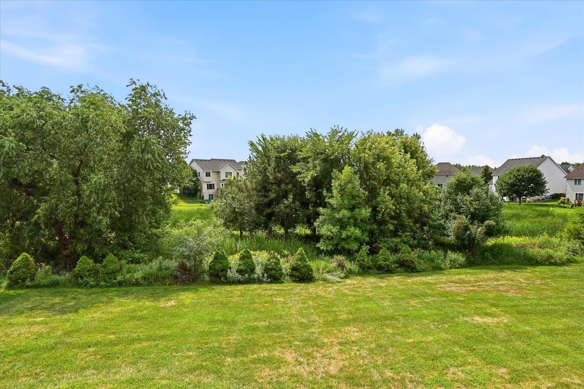 Enjoy peaceful backyard views from the deck.
