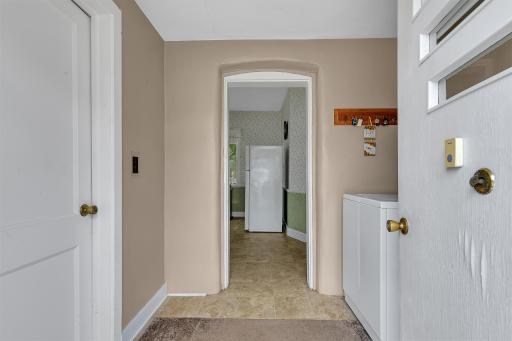 Back entrance brings you through the laundry room
