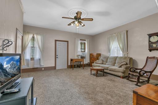 A large living room also filled with natural light