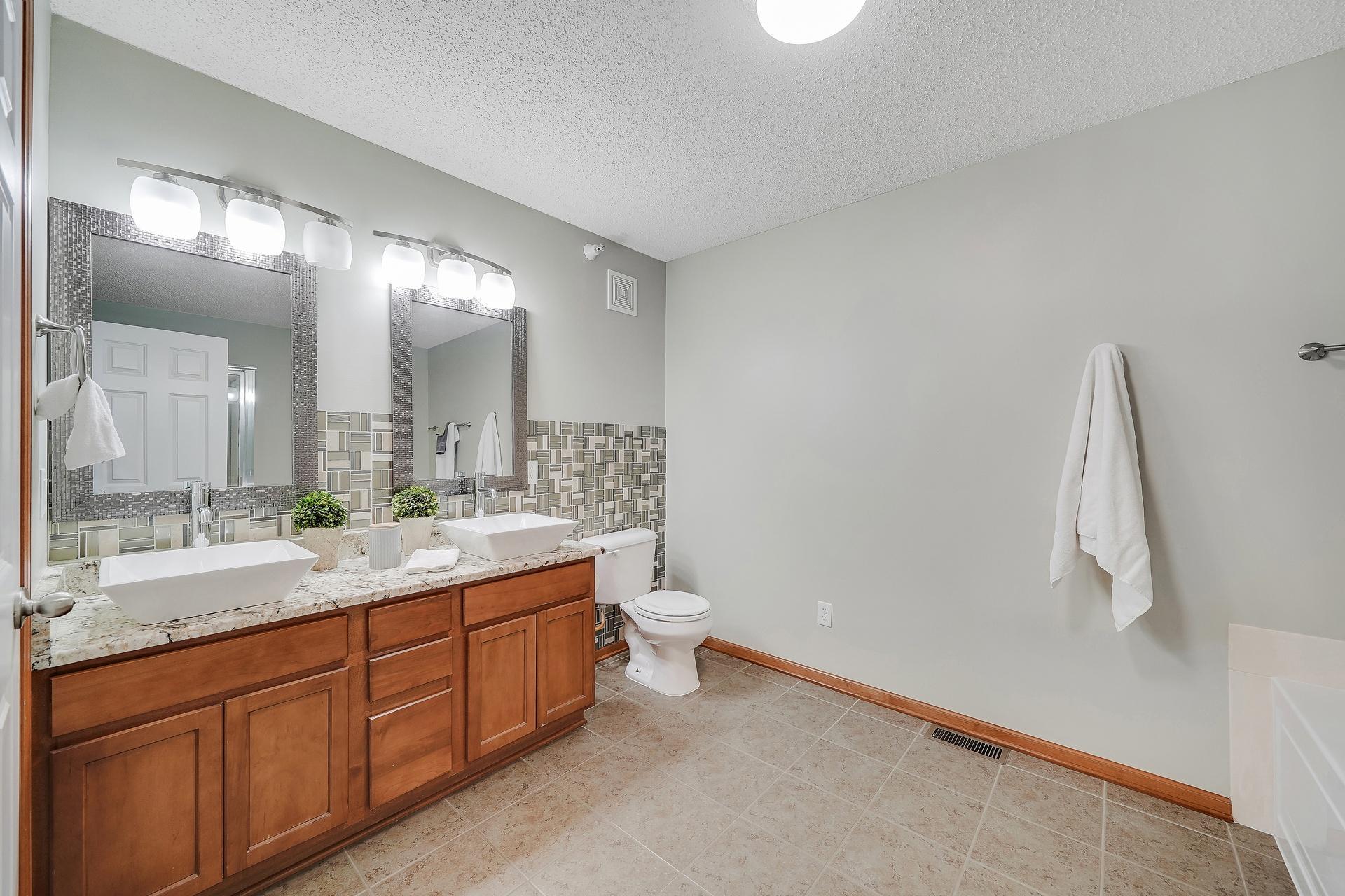 Updated upper level full bath.