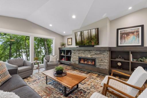 Main Floor living room, gorgeous views, gas fireplace.