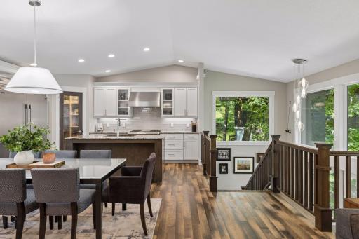 Open living, dining, and kitchen, with granite countertops, stainless steel appliances, and great pantry space.