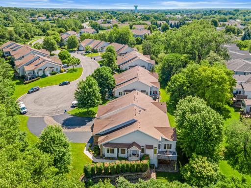 Prime end-unit location surrounded by mature trees, extra-long driveway- perfect for guests!