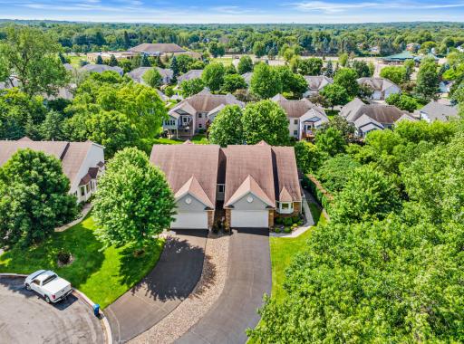Welcome to this exceptional Weston Woods end-unit townhome. Great long driveway for guests.