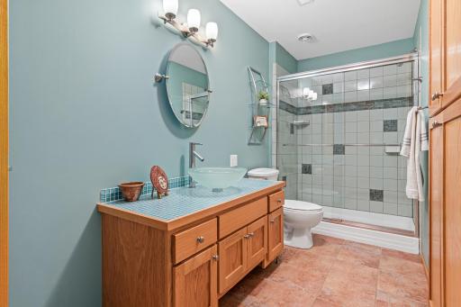 3/4 lower-level bath for guests and family.