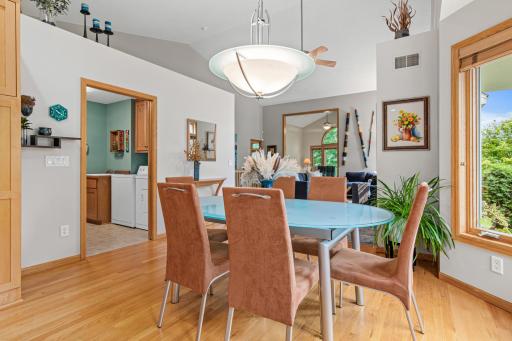 Dining area filled with natural light and beautiful views.