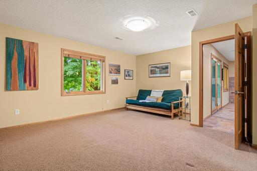 Spacious third bedroom with huge walk-in closet and 3/4 bathroom nearby.