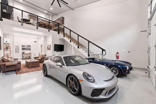 Virtually Staged - Collector space meets private lounge, giving you a place to enjoy the cars instead of simply storing them.