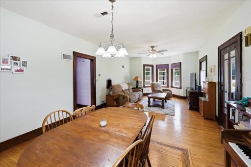 Custom inlaid hardwood flooring in the dining area.