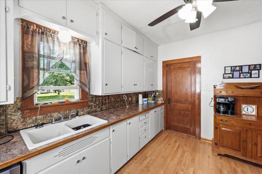 Tons of cabinet space here and a kitchen window for views of the backyard.