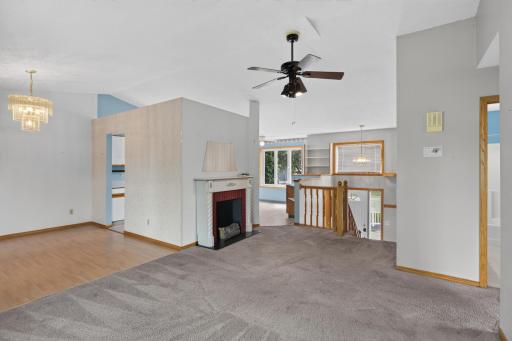Main level: open concept living room, dining room, kitchen