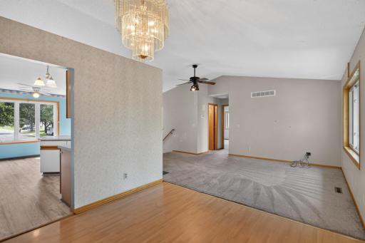 Main level: living room (standing in the dining room)