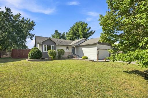 Welcome to this beautifully maintained 4-bedroom, 2-bathroom rambler in highly sought-after Meadows of Round Lake!