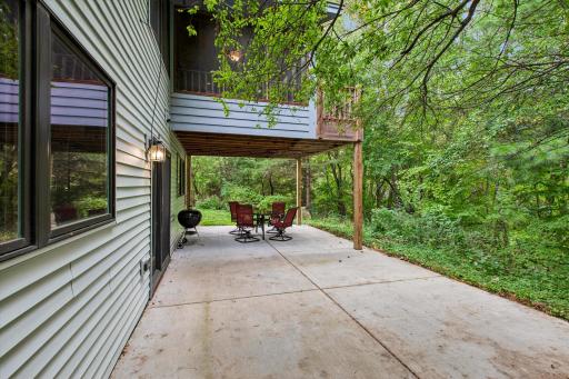 Large patio to enjoy the surrounding trees and nature