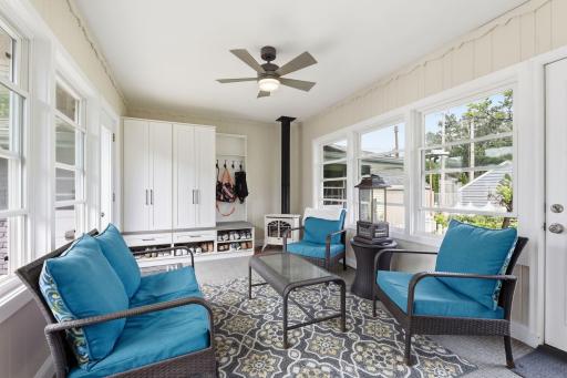 Inviting completely enclosed porch with heat with access to private patio and to home