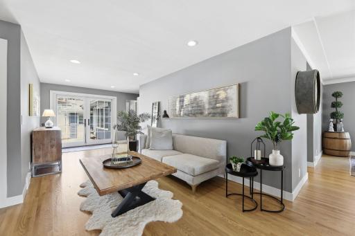 Warm inviting sitting area adjacent to living room and private back patio.