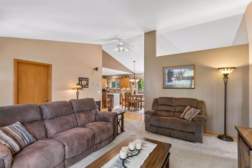 An open flow from the living room to the kitchen.