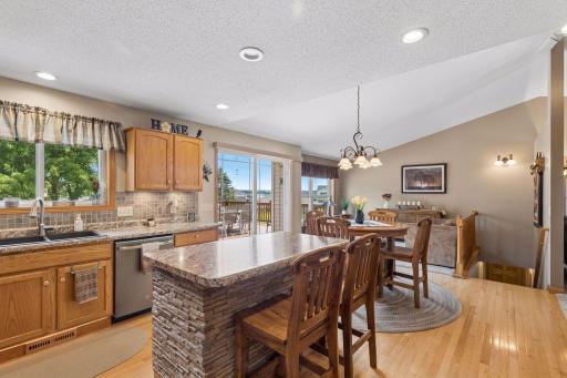 The center island and deck access make entertaining effortless.