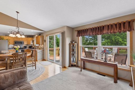 Wall-to-wall windows and direct access to the expansive deck.