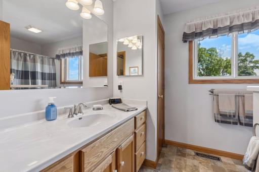 The refreshed primary ensuite offers a clean, updated feel.