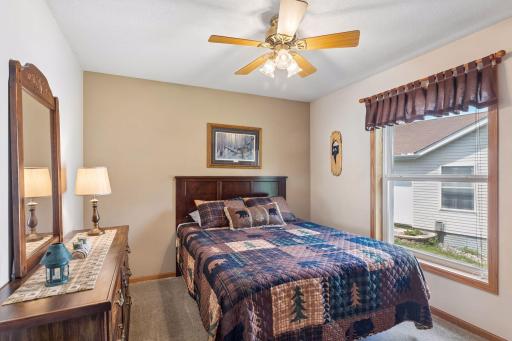 Comfortable third bedroom on the main level.