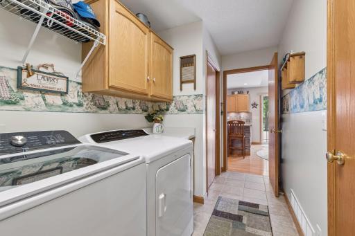 Laundry day is a breeze with this spacious utility room.