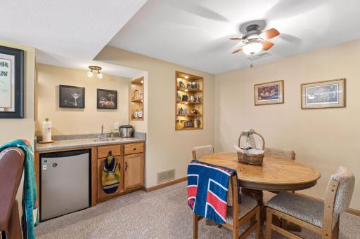 Charming built-ins add character to the wet bar area.