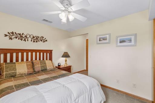 The fourth bedroom connects to a convenient three-quarter bath.