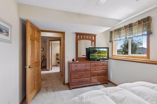 Large windows bring wonderful natural light into the guest suite.