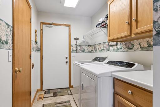Functional mudroom and laundry space just off the garage.