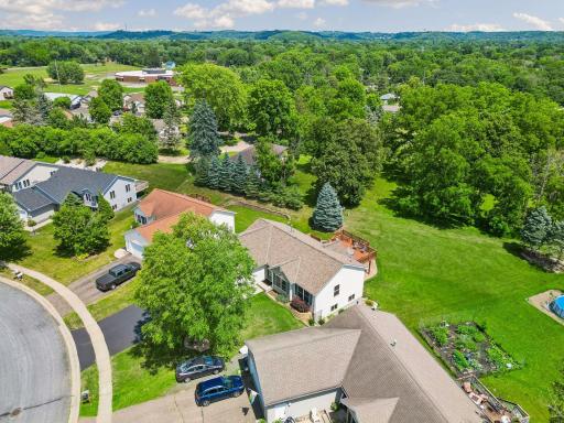 Enjoy the privacy of mature trees surrounding this generous backyard retreat.