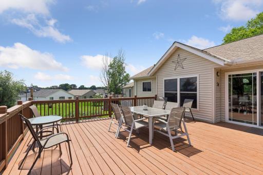 The upper deck is perfect for grilling, dining, and gathering outdoors.