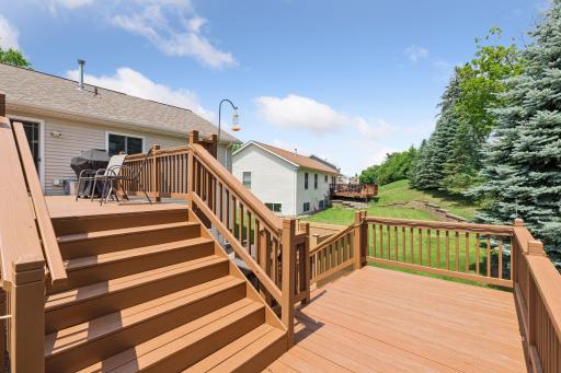 he two-tier deck offers multiple spaces to relax and entertain.