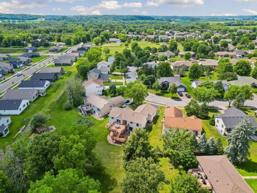 Enjoy the privacy of mature trees surrounding this generous backyard retreat.